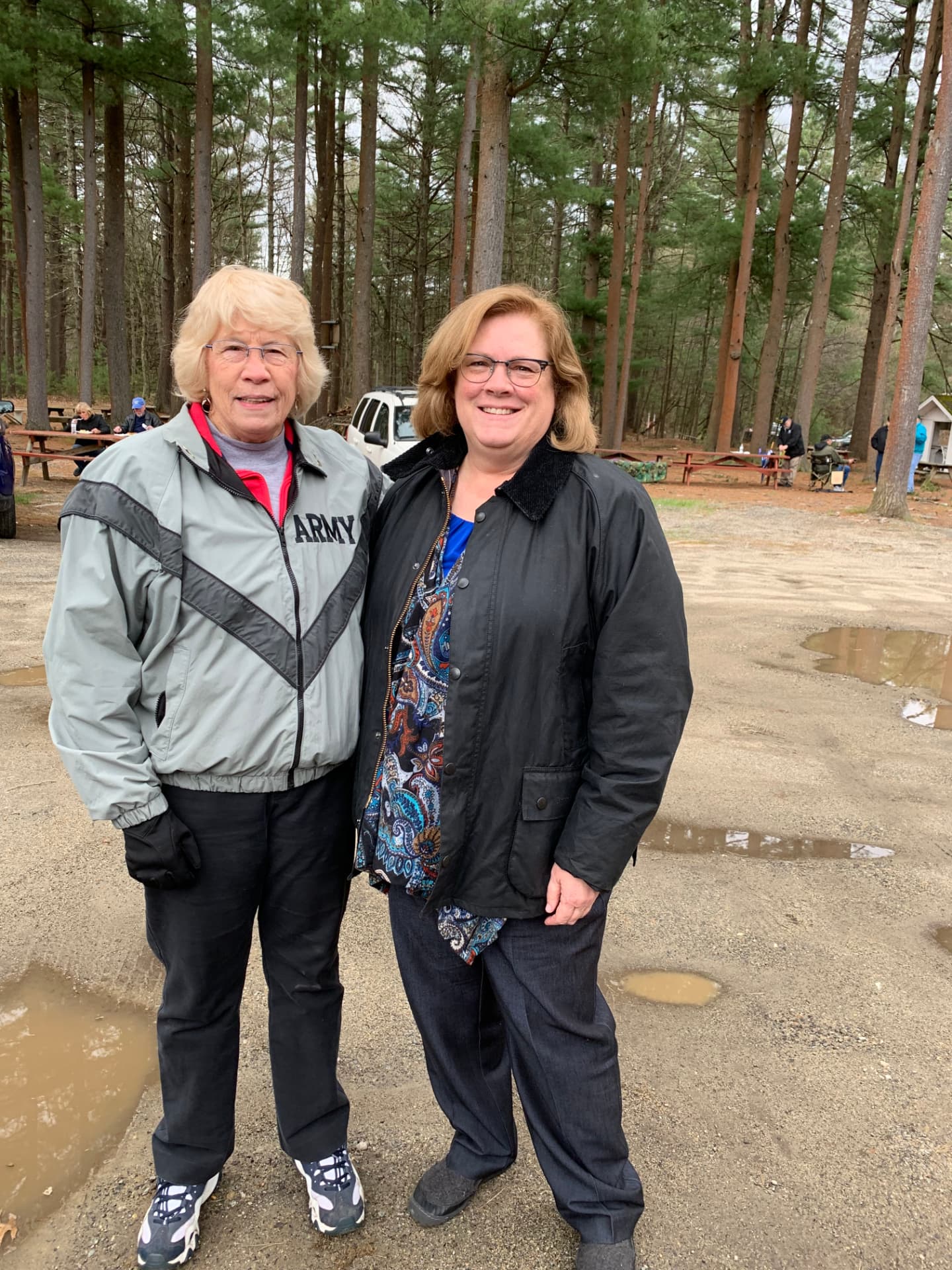 Sharon Carson with a fellow Army veteran at an outdoor gathering