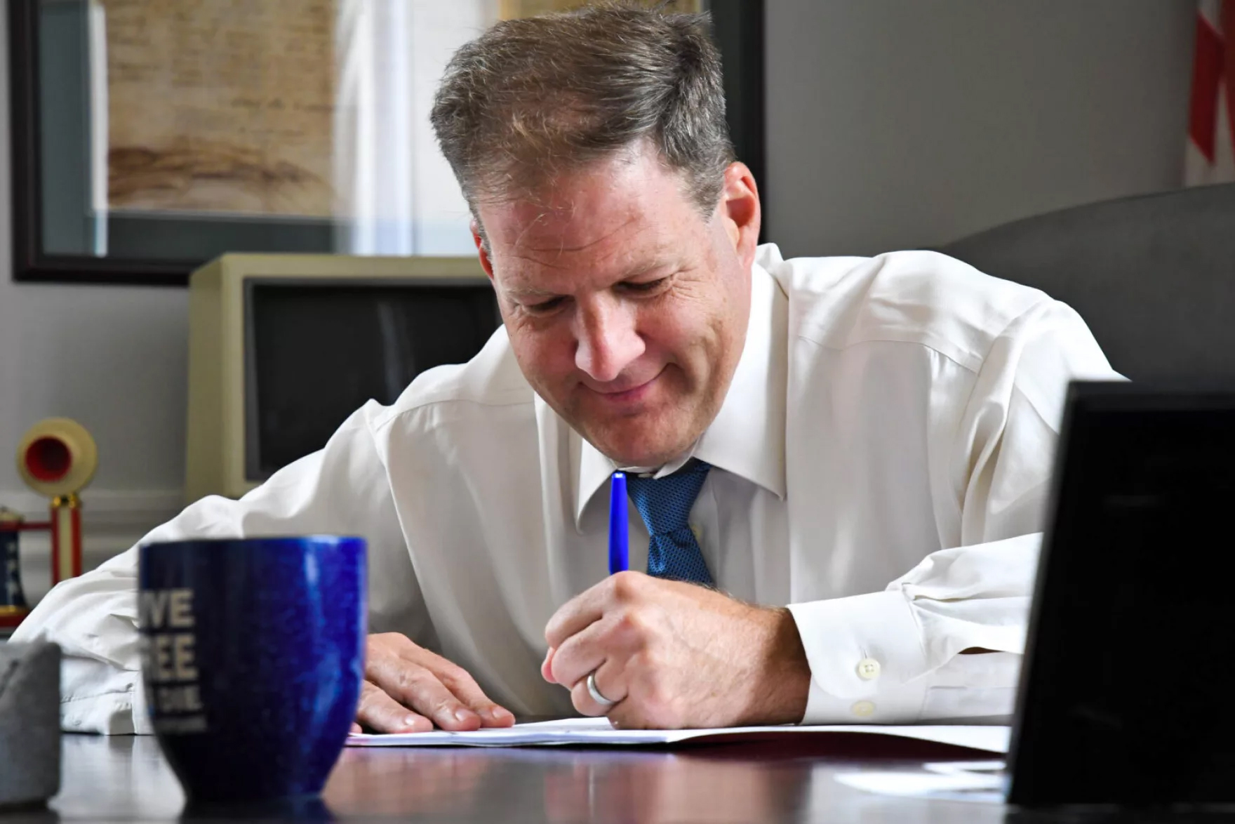 Gov. Chris Sununu, shown here in a file photo, signed Senate Bill 94 into law on Monday.